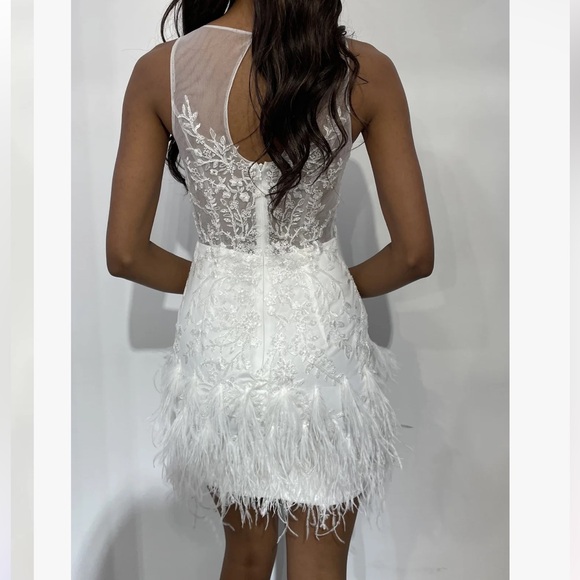 Jovani Scoop neck flower embellished bodice with mesh and a feathered Miniskirt. - Picture 2 of 10
